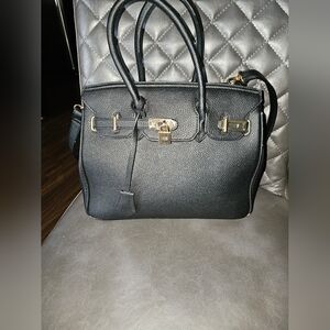 Business casual handbag black in color